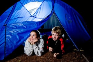 Kids camping in a tent